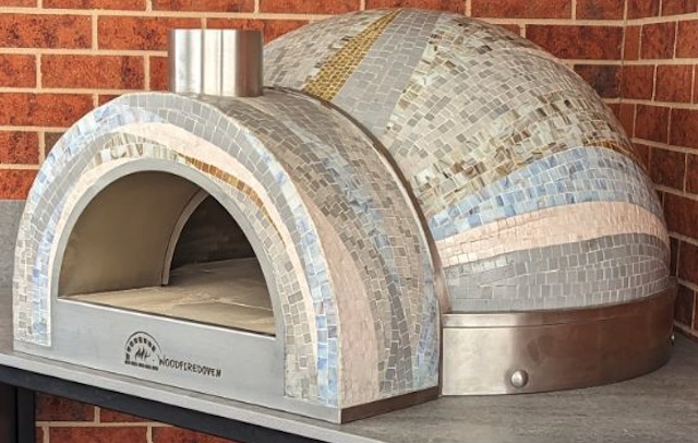 Chef mosaic art pizza oven