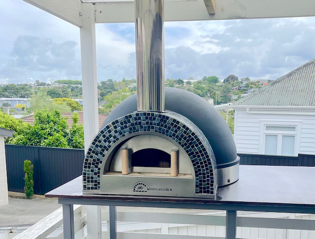 Chef pizza oven on balcony